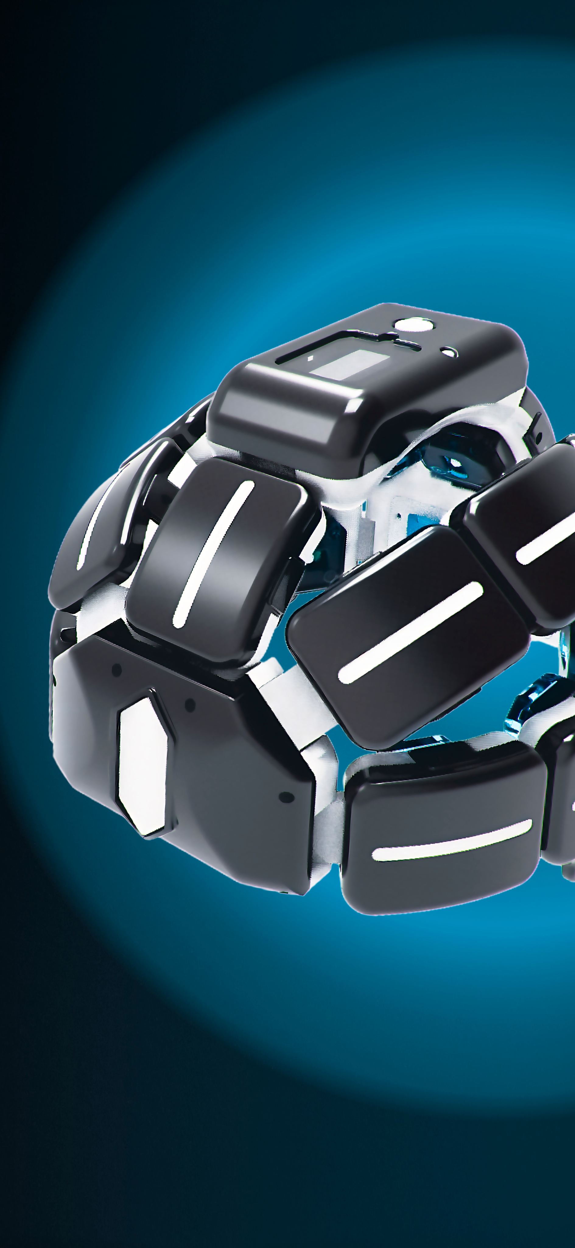 Photo of two women and a man talking in the corner of a room with modern furniture.